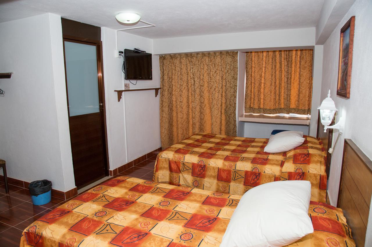 Hotel Symer Чигнауапан Екстериор снимка